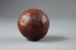 An Antique Red Leather Ball