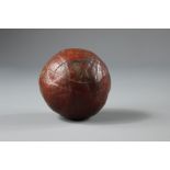 An Antique Red Leather Ball