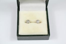 A Pair of 18ct Gold Diamond Ear Studs