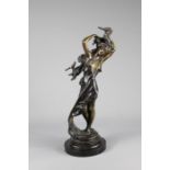 An Art Nouveau-Style Bronzed Figurine of a Lady