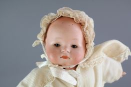 A German Porcelain-Headed Doll