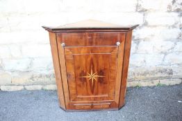 A Mahogany Corner Cupboard