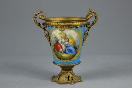 An Antique Sevres Gilt Ormolu Twin-Handled Vase