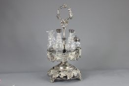 An Ornate Victorian Silver Plated Double Cruet