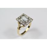 An 18ct Yellow Gold Diamond and Aquamarine Ring