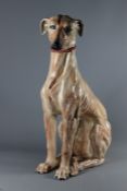 A Large Ceramic Sculpture of a Greyhound