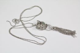 A Cartier-Style Silver Leopard Head Pendant and Chain