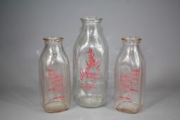 A Quantity of American Glass Milk Bottles