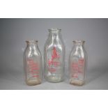 A Quantity of American Glass Milk Bottles