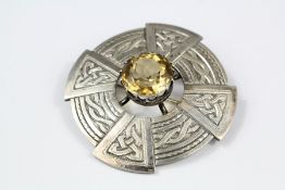 A Silver Citrine Celtic Knot Brooch