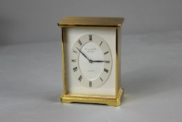 A Gilt Brass Clock