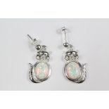 A Pair of Silver and Opal Earrings