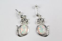 A Pair of Silver and Opal Earrings