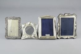 Four Miniature Silver Photo Frames