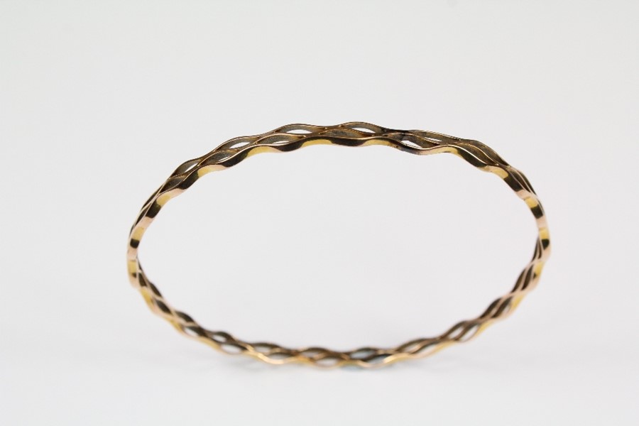 A 9ct Gold Wave Link Bangle