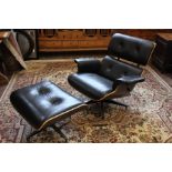 A Black Leather Eames-style Chair and Ottoman