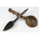 A Carved Pointed Wooden Ladle