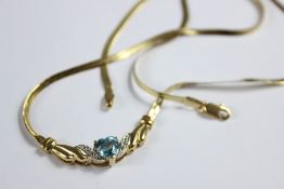 A 14ct Yellow Gold Aquamarine and Diamond Necklace