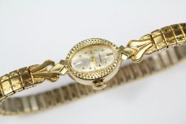 A Lady's 14ct Yellow Gold Longines Wrist Watch