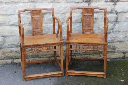 A Pair of Chinese Hardwood "Throne" Chairs