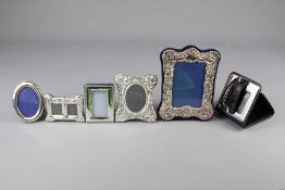 Six Silver Miniature Photo Frames