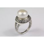 A Silver and Pearl Ring