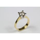 A 18ct Yellow and White Gold Solitaire Diamond Ring