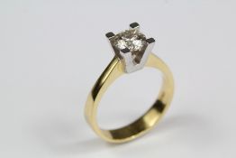 A 18ct Yellow and White Gold Solitaire Diamond Ring
