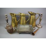 Three Graduated Brass Cider Jugs