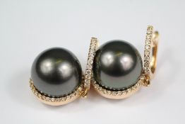 A Pair of 18ct Yellow Gold and Black Tahitian Pearl Earrings