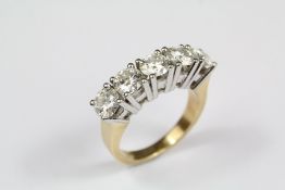 An 18ct Yellow and White Gold Diamond Ring