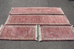 Four 20th Century Woollen Carpets