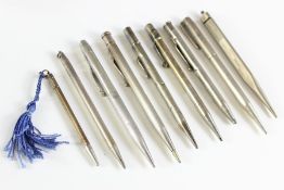 Nine Vintage Silver Propelling Pencils