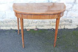 An Antique Mahogany Card Table