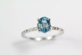 An 18ct White Gold and Topaz Ring