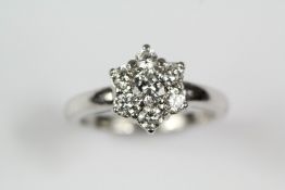 An 18ct White Gold Diamond Cluster Ring