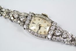 A Lady's 14ct White Gold and Diamond Cocktail Watch