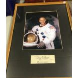 Space: Buzz Aldrin autographed on National Geographic card or paper in 16" x 12½" frame below 9" x