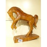 WOODEN STATUE OF A PRANCING HORSE 34 CMS