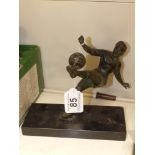 SPELTER FIGURE OF A FOOTBALLER ON MARBLE BASE