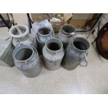 SIX GALVANISED MILK CHURNS