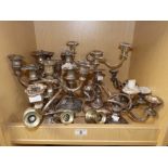 A QUANTITY OF SILVER PLATED CANDELABRAS