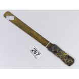 A LATE 19TH CENTURY JAPANESE ANTIMONY PAPER KNIFE WITH ANIMAL DECORATION ON THE HANDLE