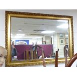 GILT FRAMED BEVELLED EDGED WALL MIRROR 104 X 74 CMS