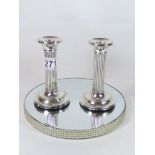 A PAIR OF BIRMINGHAM HALLMARKED SILVER CORINTHIAN CANDLESTICKS 14CMS HIGH