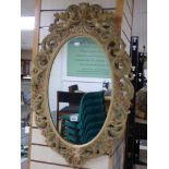 ORNATE CHERUB DECORATED OVAL WALL MIRROR (92 X 60)