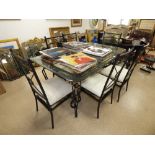 A IRON FRAMED GLASS TOP DINING TABLE AND 6 MATCHING CHAIRS