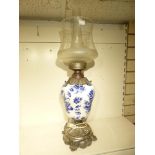 LARGE BLUE AND WHITE CERAMIC AND SILVER PLATE WITH CONVERTED GLASS OIL LAMP