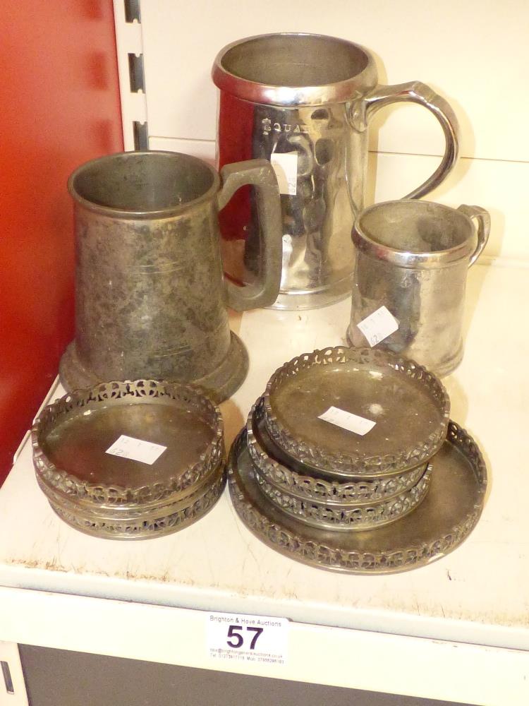 A POLISHED PEWTER QUART TANKARD TOGETHER WITH TWO OTHERS AND A SET OF ITALIAN LAVORAZIONE A MANO