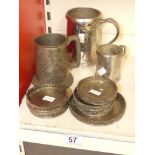 A POLISHED PEWTER QUART TANKARD TOGETHER WITH TWO OTHERS AND A SET OF ITALIAN LAVORAZIONE A MANO